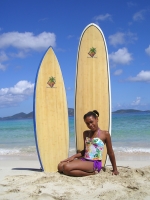 Sabrina models our surfboards!